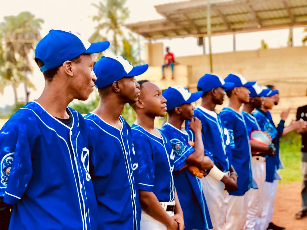 Dragons player encouraging a catcher during training